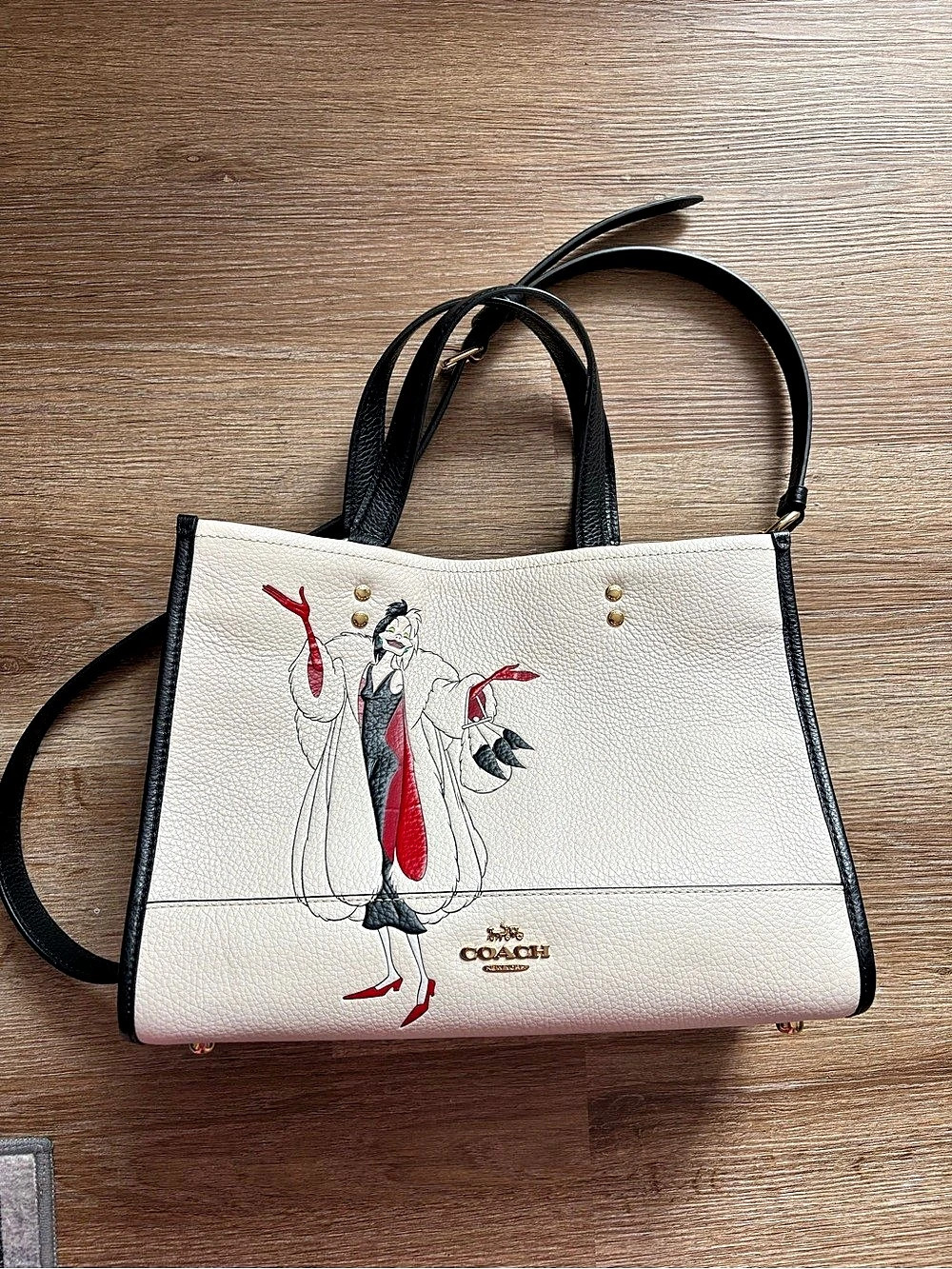 Coach Disney x Coach Dempsey Carryall with Cruella Motif Dempsey Carryall